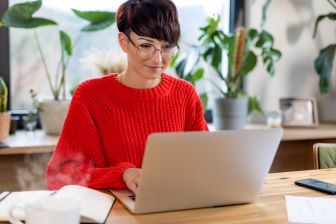 Woman on laptop working